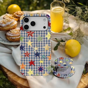 May include: A blue and white gingham patterned phone case and matching circular phone grip. The design features a scattered print of multi-coloured stars in shades of red, yellow, orange, green, and dark blue across the checkered background.