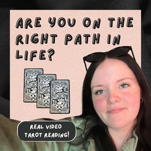 May include: Image features three tarot cards with intricate black and white designs, set against a pink background. Text overlay reads "ARE YOU ON THE RIGHT PATH IN LIFE?" and "REAL VIDEO TAROT READING!" A person is in the image.