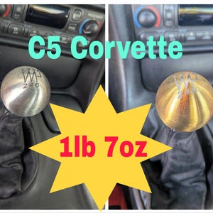 May include: A pair of C5 Corvette shift knobs. One is silver, the other is gold. The silver knob has the numbers 135 and 246 etched on it. The gold knob has the same numbers etched on it. The weight is 1lb 7oz.