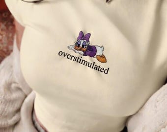 Daisy Duck Embroidered "Overstimulated"Baby Tee, Funny Disney Adult Tee, Cute Disney Crop Top, Mental Health Meme Top, Gift for Disney Lover