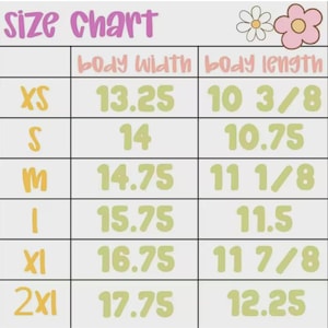 May include: A size chart with measurements in inches for body width and body length. Sizes range from XS to 2XL. The chart includes a daisy graphic and the words "Size Chart" in a purple font.