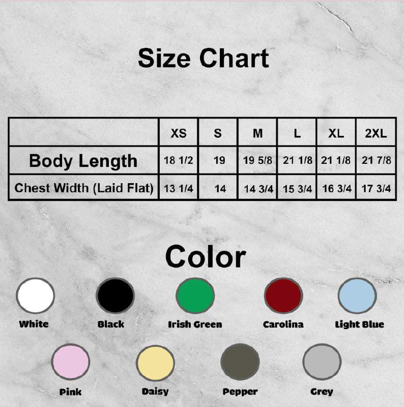 May include: A clothing size chart with measurements in inches for body length and chest width, ranging from XS to 2XL. The image also displays a colour chart with options such as white, black, Irish green, Carolina, light blue, pink, daisy, pepper, and grey.