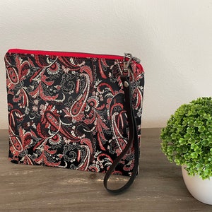 Cartera de mano/mango en piel, tela estampada roja y forro interior rojo