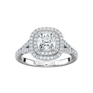 May include: A silver engagement ring with a large, square-cut center stone surrounded by two halos of smaller stones. The band is also adorned with smaller stones, creating a sparkling effect. The ring is set against a white background.