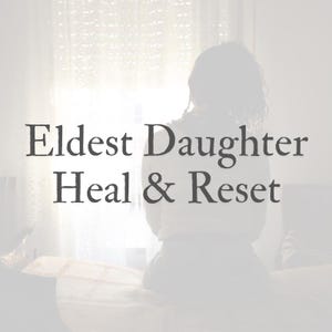 May include: Image features the text "Eldest Daughter Heal & Reset" in a dark font. A person is seen from the back, seated on a bed, with a soft, blurred background. The overall tone is calm and introspective.
