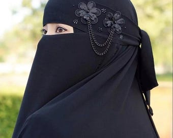 Floraler Niqab Schleier: Islamische Gesichtsbedeckung