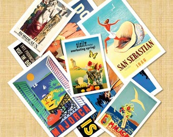 May include: A collection of vintage-style travel posters featuring illustrations of Bordeaux, San Sebastian, Sicily, Majorca, and Malaga. The rectangular prints display colorful scenes of coastal landscapes, classical architecture, and fruit.
