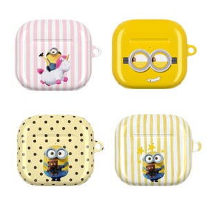 May include: Four square protective cases for wireless earbuds featuring Minion character designs. One case has pink and white stripes with a Minion on a unicorn, one is yellow with large goggles, and two feature Minions with teddy bears.