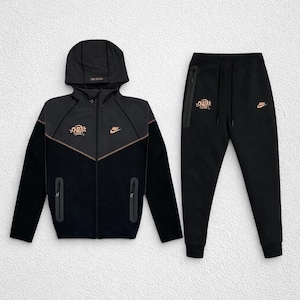 orange nike jogging suit womens