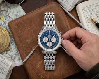 Reloj cronógrafo de aviador para hombre: acero inoxidable, esfera negra, estilo panda invertido.