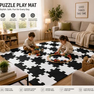 May include: Black and white interlocking puzzle play mat with children playing on it. The mat is labeled "PUZZLE PLAY MAT" and has icons for safety and ease of use. A wooden train set and building blocks are also visible.