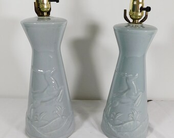 Mid Century grey ceramic bedside lamps with embossed gazelle antelope fronts, matched pair of grey lamps, 1950s lamps