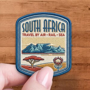 May include: A set of three ceramic mugs with a speckled, matte finish. The mugs are in shades of cream, light gray, and dark gray. Each mug has a simple, minimalist design, perfect for coffee or tea.