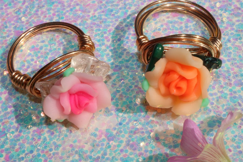 Ros\u00e8 flower ring with crystal adornment