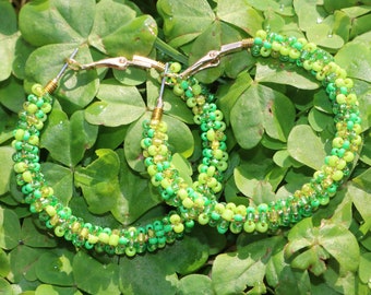 Green beaded wire wrapped hoop earrings