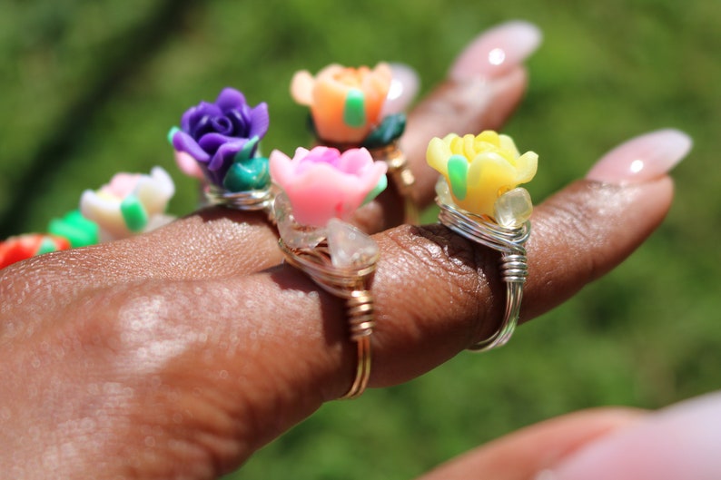 Ros\u00e8 flower ring with crystal adornment