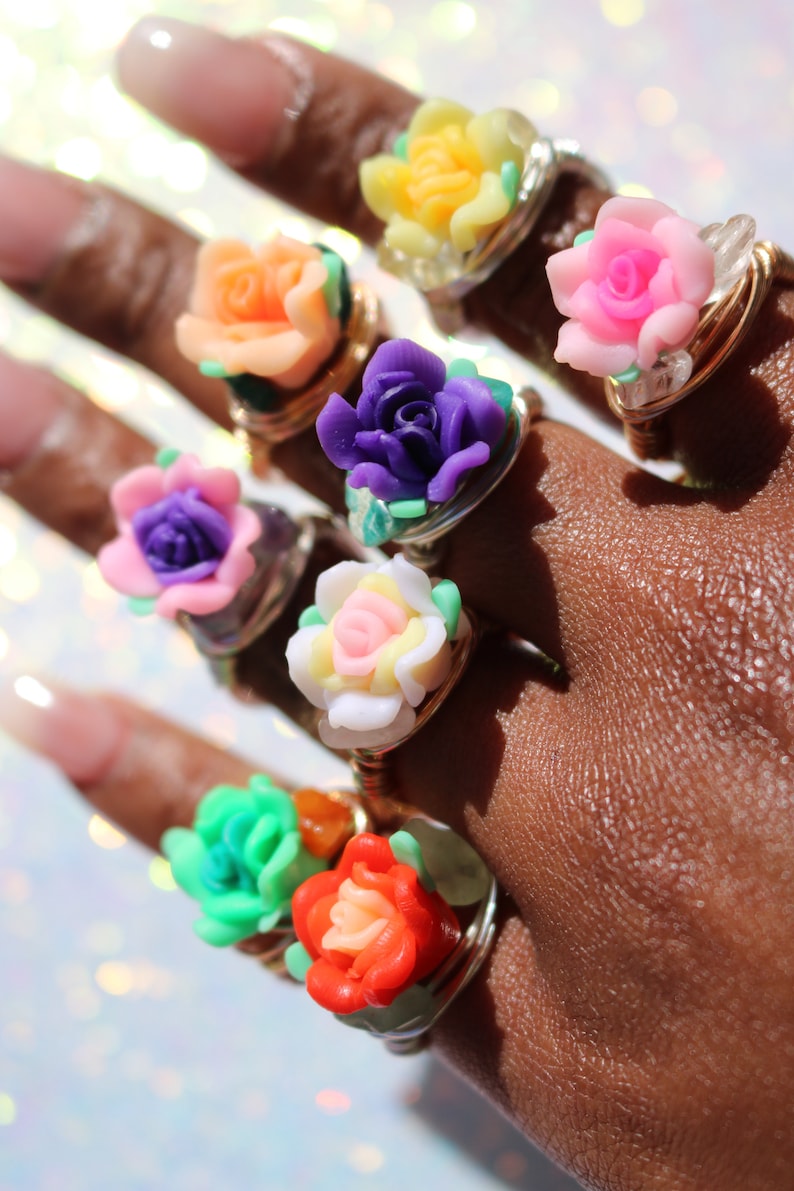 Ros\u00e8 flower ring with crystal adornment