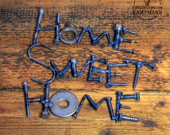 Stainless steel wall sign, handmade decoration made of screws and metal, wall decoration.
