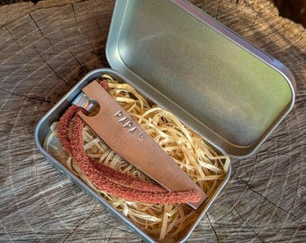 Handmade stainless steel bottle opener with letter stamps, packaged in a tin box as a gift box, e.g., a Father's Day gift for Dad or Grandpa.