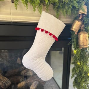 White Quilted Christmas Stocking with Red Pom Poms