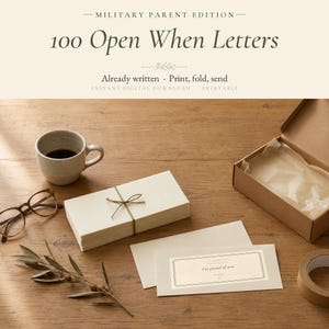 May include: A set of 100 Open When Letters for military parents, featuring a stack of cream-colored envelopes tied with green twine, a single envelope with the text I'm proud of you, a brown cardboard box, a ceramic mug, and eyeglasses.