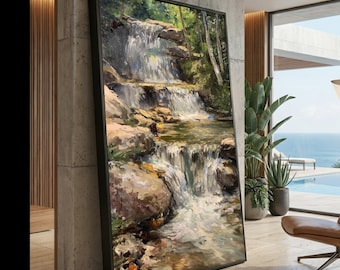 May include: A large rectangular framed wall art piece featuring an oil painting of a cascading waterfall flowing over textured rocks and through a lush green forest. The artwork uses a palette of white, blue, brown, and green tones.