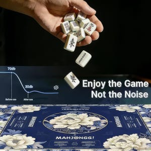 May include: A rectangular blue mahjong mat featuring a large white floral pattern and the text "MAHJONGG!" with falling white mahjong tiles. A graphic shows a sound reduction from 70db to 30db with the text "Enjoy the Game Not the Noise."