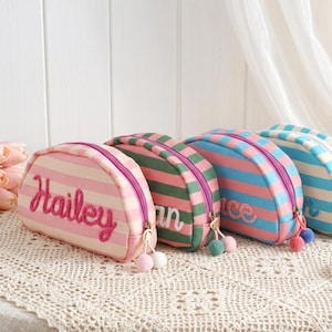 May include: A handmade wooden sign with the text "Welcome" in a playful font. The sign features a distressed white background and a dark brown border, perfect for a front door or entryway. The sign measures approximately 12 inches wide and 6 inches tall.