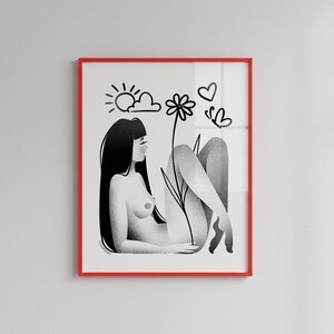 May include: Black and white art print in a red frame. The illustration depicts a person reclining with long black hair, a flower, sun, clouds, a heart, and a butterfly. The artwork has a minimalist style.