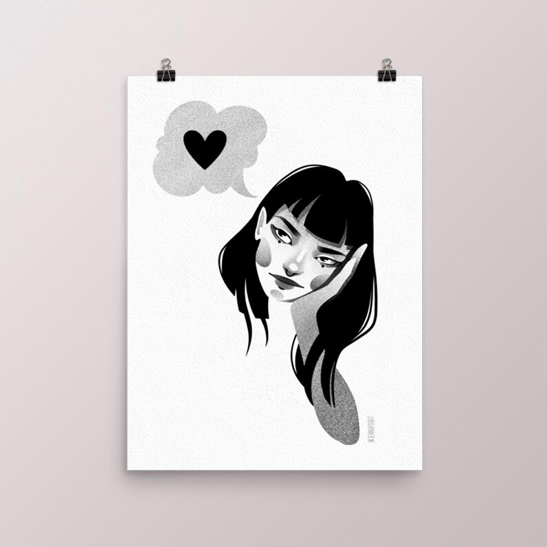May include: Black and white illustration of a woman with black hair, resting her head on her hand. A thought bubble with a black heart floats above her head. The artwork is clipped to a white background.