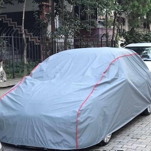頑丈な防水カーカバー | カスタムフィット | 柔らかいフリースの裏地 | 全天候型保護 | 耐風性