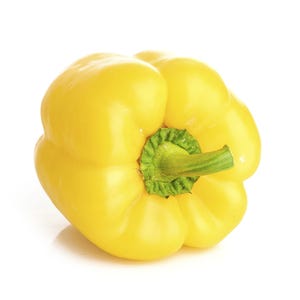 Puede incluir: Un pimiento amarillo brillante con una piel lisa y lustrosa y una forma lobulada distintiva. La verdura presenta un tallo verde central unido a un c&aacute;liz verde texturizado en forma de estrella en la parte superior, sobre un fondo blanco.