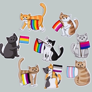 May include: Set of nine colourful cat stickers with pride flags. Each cat is holding a different pride flag, including the rainbow, bisexual, transgender, and pansexual flags.