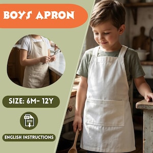 May include: A boy wearing a white apron with a large front pocket. The apron has a simple design and is labeled "BOYS APRON" in orange text. The size range is indicated as "SIZE: 6M-12Y". The image also includes the text "ENGLISH INSTRUCTIONS".