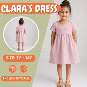 May include: A light pink short-sleeved dress with a round neckline and a gathered waistline. The image displays the text CLARA'S DRESS, SIZE: 2Y - 16Y, and ENGLISH TUTORIAL. A circular inset shows the back view of the same dress on a child.