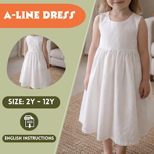 May include: A-line dress in white, sleeveless, with a button-up bodice and a gathered skirt. The dress is shown on a young person. Text on the image reads "A-LINE DRESS", "SIZE: 2Y - 12Y", and "ENGLISH INSTRUCTIONS".