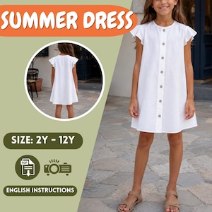 May include: A white summer dress with flutter sleeves and wooden buttons down the front. The dress is shown on a young person and includes the text "SUMMER DRESS", "SIZE: 2Y - 12Y", and "ENGLISH INSTRUCTIONS".