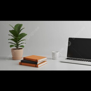 Könnte beinhalten: Ein minimalistischer Arbeitsplatz mit einem Laptop, einem Stapel orangefarbener und schwarzer Notizbücher, einer weißen Tasse und einer Topfpflanze. Die Gegenstände sind auf einer weißen Oberfläche vor einem neutralen Hintergrund angeordnet.
