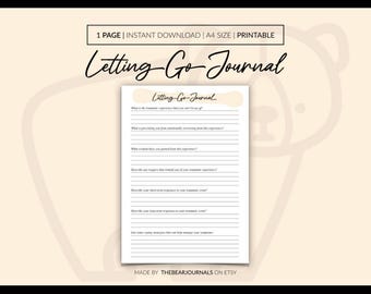May include: A printable A4 size "Letting Go Journal" with prompts for emotional recovery. The journal features a cream-colored background and a minimalist design. The text "Letting Go Journal" is displayed in elegant script.