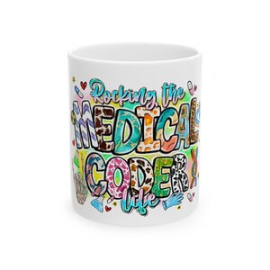 May include: White ceramic mug featuring the phrase "Rocking the MEDICAL CODER life" in a vibrant, patterned design. The mug is decorated with medical symbols, including pills, DNA strands, and a peace sign.