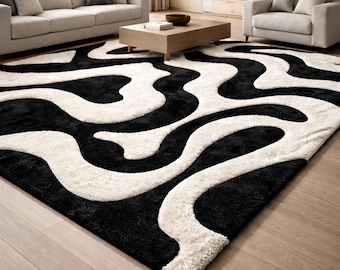 Handgetufteter Wollteppich mit abstraktem Wellenmuster, Schwarz-Creme, Bio-Shag-Teppich