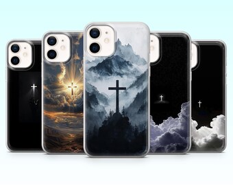 May include: A collection of phone cases featuring religious imagery. Each case displays a cross set against a backdrop of clouds, mountains, or a starry sky. The color palette includes shades of black, white, blue, and gold.