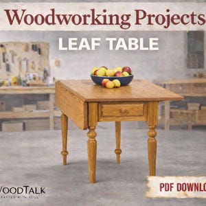 May include: A wooden leaf table with a drawer, displayed in a workshop setting. The table is made of light-colored wood and has a square top with a drop-leaf design. A blue bowl filled with apples sits on the table. The image includes the text "Woodworking Projects" and "LEAF TABLE".