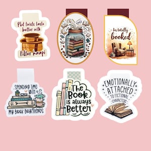May include: A collection of six colorful, illustrated bookmarks with text. The bookmarks feature phrases like "Plot twists taste better with Filter kaapi" and "I'm totally booked." Other designs include stacks of books and coffee cups.