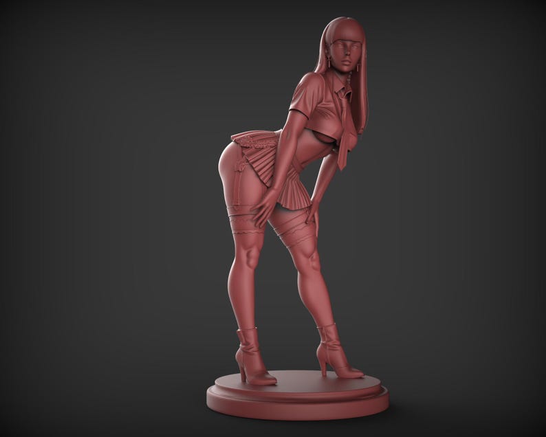 May include: A monochromatic sculpture of a person in a school uniform, leaning forward with hands on knees. The figure wears a short pleated skirt, thigh-high stockings, and heeled boots. The sculpture is on a circular base.