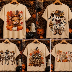 Könnte beinhalten: Eine Kollektion von fünf beigen T-Shirts mit kurzen Ärmeln und verschiedenen herbstlichen Grafikdrucken, darunter ein Hochlandrind mit Kürbissen, ein Geist mit Cowboyhut, drei gemusterte Geister, ein Kürbisstapel und das Wort FALL mit Stiefeln.