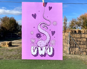 May include: A lilac-colored poster with a whimsical illustration of a creature with the text "UWU" at the bottom. The artwork features hearts and flowers, and is held by a red and white clothespin on a clothesline against a blue sky.
