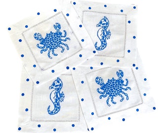 Servilletas de lino de cangrejo moteado azul y blanco y caballito de mar