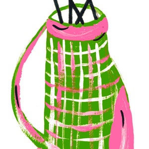May include: A green and pink plaid golf bag with a pink handle and four blue golf clubs sticking out of the top.