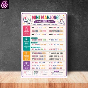 May include: A rectangular Mini Mahjong simplified card featuring colorful instructional text and game rules. The white card displays four numbered sections with various letter and number combinations, including Flower, Dragon, and Wind tile symbols.